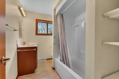 Bath - 311 E Oak Ave, Olivia, MN 56277 photo 2 of 3