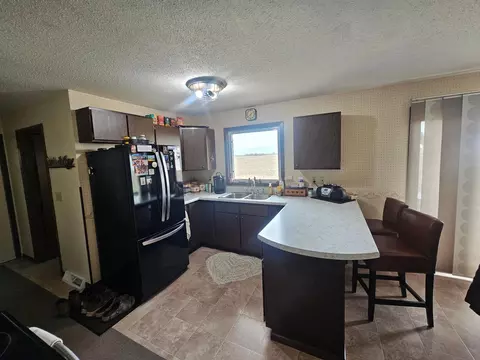 Kitchen - 306 Enterprise Dr, Mooreton, ND 58061 photo 3 of 5