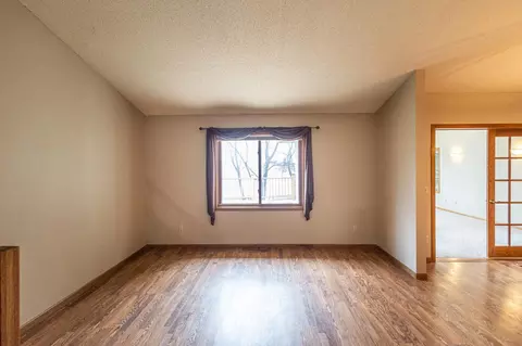 Living - 1011 Independence Ln N, Champlin, MN 55316 photo 1 of 10