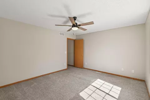 Bedroom - 13402 Ximines Ln N, Champlin, MN 55316 photo 3 of 4