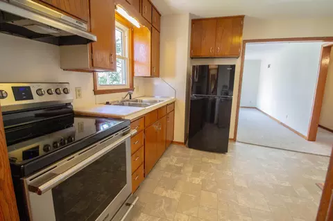 Kitchen - 401 13th Ave NE, Austin, MN 55912 photo 1 of 2