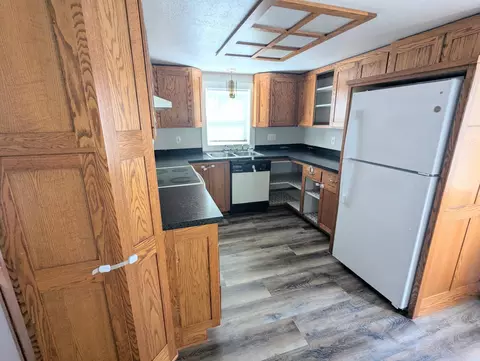Kitchen - 907 2nd Ave NW, Faribault, MN 55021 photo 2 of 2