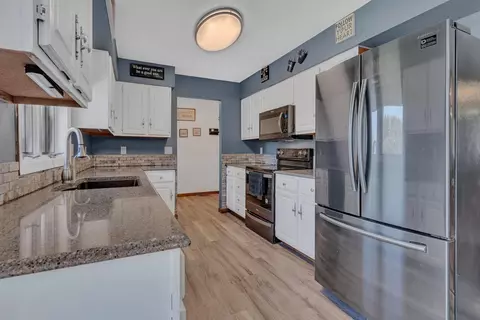 Kitchen - 608 E Ash Ave, Olivia, MN 56277 photo 2 of 2