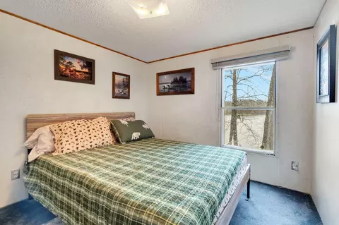Bedroom - w7762 Rainbow Drive, Spooner, WI 54801 photo 3 of 4