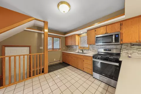 Kitchen - 24 12th St NW, Faribault, MN 55021 photo 2 of 5