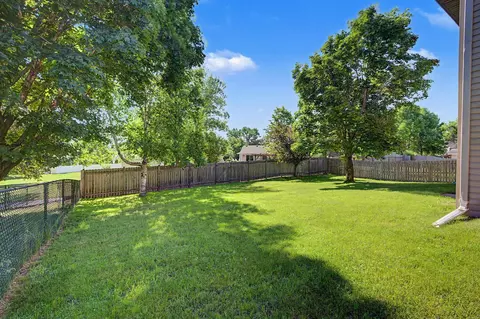 Exterior - 11120 Hampshire Ct E, Champlin, MN 55316 photo 6 of 8