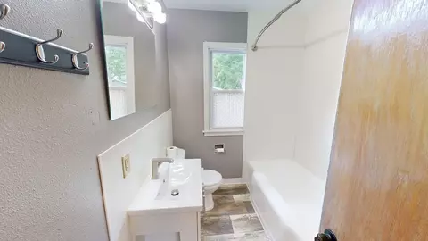 Bath - 1004 6th St SW, Willmar, MN 56201 photo 2 of 4