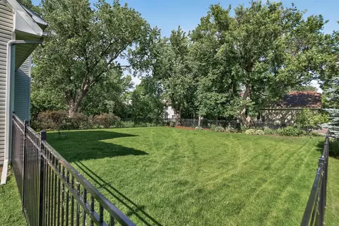 Exterior - 413 Nathan Ln N, Champlin, MN 55316 photo 4 of 7