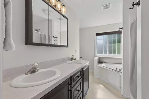 Bath - 413 Nathan Ln N, Champlin, MN 55316 photo 1 of 5