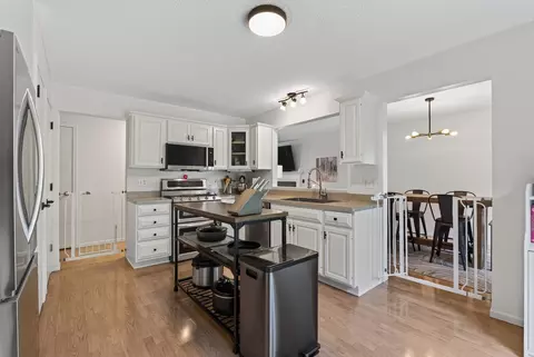 Kitchen - 413 Nathan Ln N, Champlin, MN 55316 photo 2 of 3