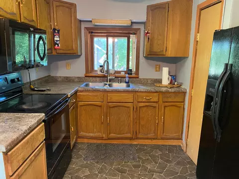 Kitchen - 408 Coon Ave S, Frederic, WI 54837 photo 2 of 3