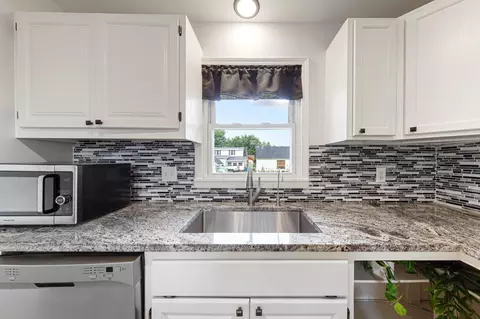 Kitchen - 304 20th St NW, Faribault, MN 55021 photo 5 of 6
