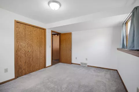 Bedroom - 717 Colonial Cir, Faribault, MN 55021 photo 8 of 9