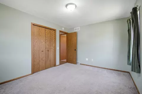 Bedroom - 717 Colonial Cir, Faribault, MN 55021 photo 2 of 9
