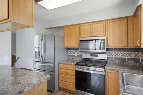 Kitchen - 717 Colonial Cir, Faribault, MN 55021 photo 3 of 4