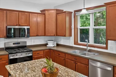 Kitchen - 10909 Quail Ave N, Champlin, MN 55316 photo 2 of 3
