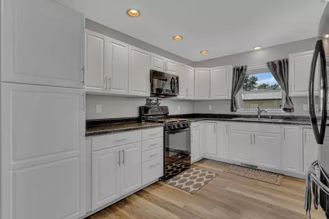 Kitchen - 613 Elm Ave, Olivia, MN 56277 photo 1 of 4