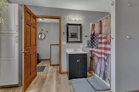 Bath - 613 Elm Ave, Olivia, MN 56277 photo 1 of 3
