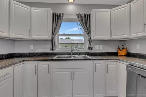 Kitchen - 613 Elm Ave, Olivia, MN 56277 photo 3 of 4