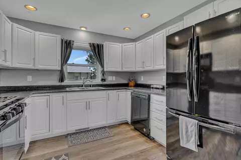 Kitchen - 613 Elm Ave, Olivia, MN 56277 photo 2 of 4