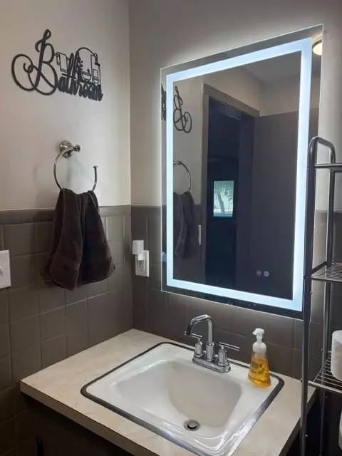 Bath - 600 Elm Ave, Olivia, MN 56277 photo 2 of 2