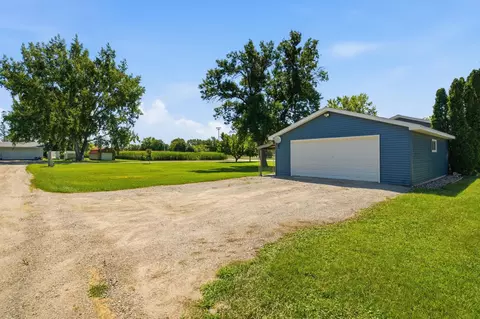 Exterior - 604 E Walnut Ave, Olivia, MN 56277 photo 7 of 11