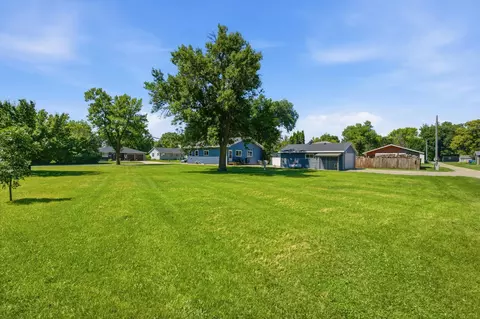 Exterior - 604 E Walnut Ave, Olivia, MN 56277 photo 4 of 11