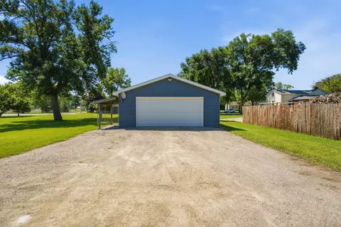 Exterior - 604 E Walnut Ave, Olivia, MN 56277 photo 6 of 11