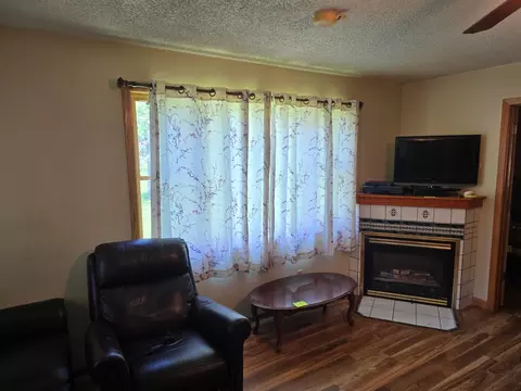 Living - 604 E Willow Ave, Olivia, MN 56277 photo 2 of 2