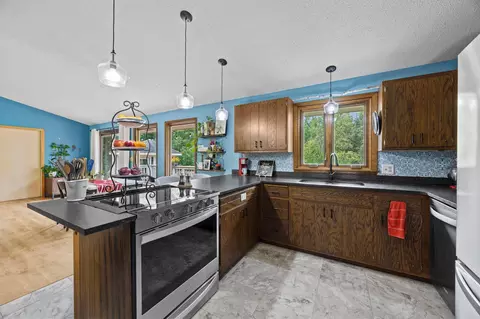 Kitchen - 475 Riverside St, Mora, MN 55051 photo 2 of 7