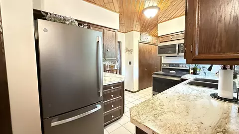 Kitchen - 829 3rd Ave, Madison, MN 56256 photo 5 of 6