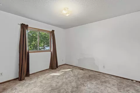 Bedroom - 1325 Xylon Ave N, Champlin, MN 55316 photo 2 of 7