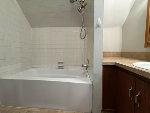 Bath - 505 S 7th St, Olivia, MN 56277 photo 1 of 2