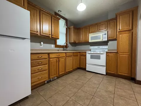 Kitchen - 505 S 7th St, Olivia, MN 56277 photo 1 of 2