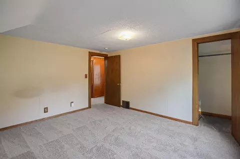 Bedroom - 416 3rd St NE, Faribault, MN 55021 photo 2 of 7
