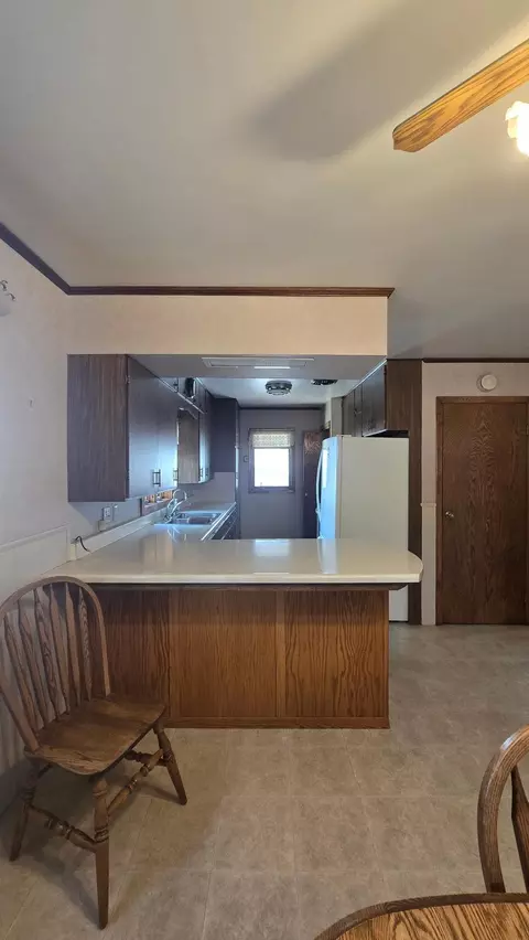 Kitchen - 207 E Lyon St, Marshall, MN 56258 photo 2 of 5