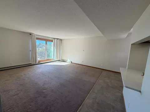 Living - 1801 Becker Ave SE #306, Willmar, MN 56201 photo 2 of 2