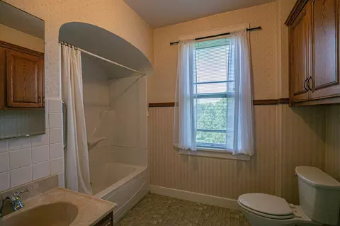 Bath - 301 E Depue Ave, Olivia, MN 56277 photo 2 of 2