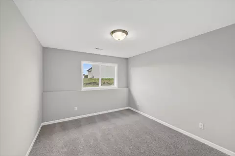 Bedroom - 1052 E Meadowsweet Dr, River Falls, WI 54022 photo 7 of 8