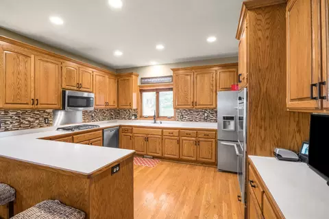 Kitchen - 10512 Hidden Oaks Ln N, Champlin, MN 55316 photo 3 of 4