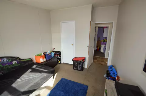 Bedroom - 122 E Main St, Mount Hope, WI 53816 photo 6 of 8