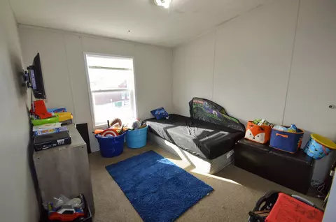 Bedroom - 122 E Main St, Mount Hope, WI 53816 photo 5 of 8