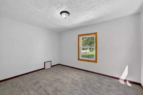 Bedroom - 972 E Philhower Rd, Beloit, WI 53511 photo 2 of 3