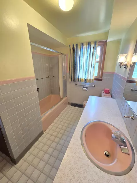 Bath - 56 E Charles St, Markesan, WI 53946 photo 1 of 2