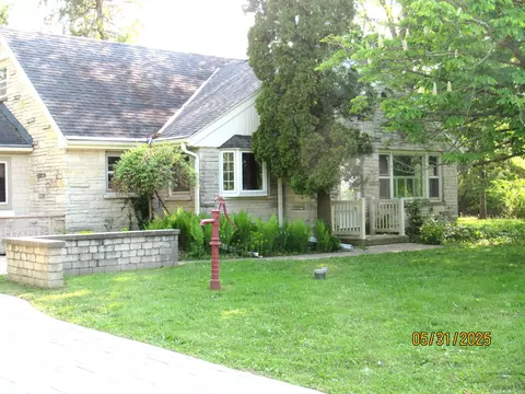1201 W Brown Deer, River Hills, WI 53217