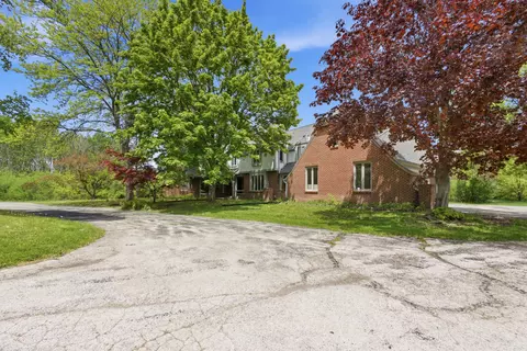9090 N Greenbrook, River Hills, WI 53217