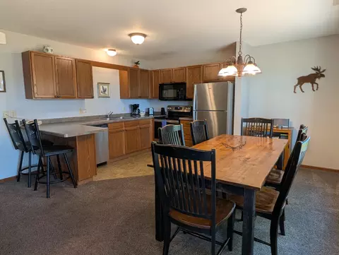 Dining - 2002 Wild Eagle Ln #124, Eagle River, WI 54521 photo 2 of 2