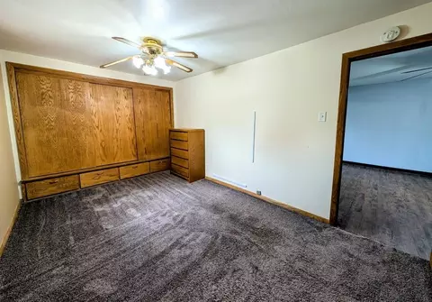 Bedroom - 725 Main St, Wrightstown, WI 54180 photo 2 of 4