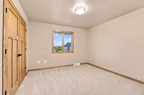 Bedroom - 212 Kerrigan Dr, Wrightstown, WI 54180 photo 2 of 5