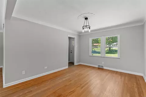 Living - 231 Wooster Dr, Ferguson, MO 63135 photo 5 of 10